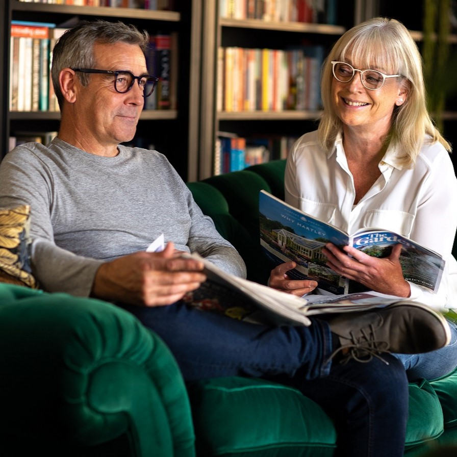 couple talking while reading together