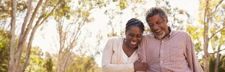 couple laughing together outside